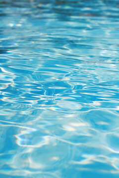 High angle view of swimming pool rough water under the sun