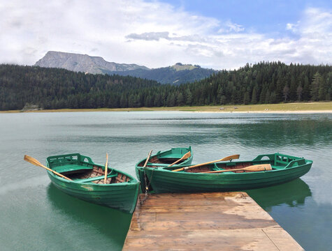 Mountain landscape behind renting boats