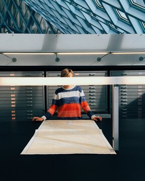 Reading maps at the library on a sunny day