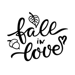 Fall in Love text. Hand written lettering on white. Calligraphic phrase with autumn sketch element. Falling leaf, acorn, heart. Modern brush quote isolated on white background. Fall Saying