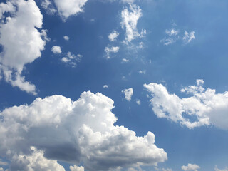 White clouds in the blue summer sky