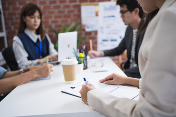Asian group of business people working in office