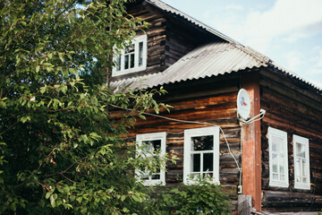 Fototapeta na wymiar village house and tree
