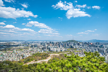 Seoul skyline, South Korea. View from inwangsan mountain,The high angle view of Seoul during the day with the blue sky and beautiful clouds.