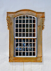 Ancient colonial window in Tiradentes, Minas Gerais, Brazil