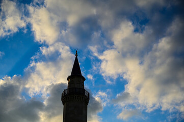 Fototapeta premium The setting sun shines on the minaret of the Ar-Rahma mosque in Kyiv, Ukraine