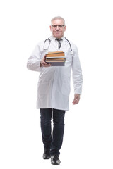 in full growth. a successful doctor with a stack of books