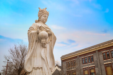 Fototapeta na wymiar Mazu is a Chinese sea goddess, adjacent to Tianhou Temple at Guwenhua Jie street in Tianjin, China