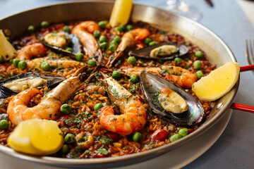 Fototapeta na wymiar Spanish rice dish paella with seafood in a pan