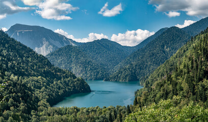 Panoramic view of Lake Ritsa at Caucasus mountains background in Abkhazia