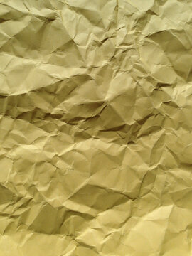 Close up of crumpled piece of colorful construction paper