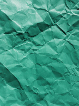 Close up of crumpled piece of colorful construction paper