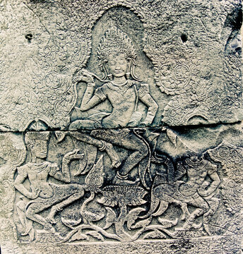 Carvings on wall at the Bayon of Angkor