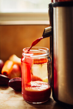 Making healthy juice with juicer