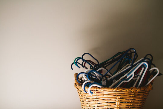laundry hangers in a basket