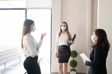 Business team having meeting during pandemic