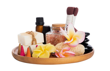 Obraz na płótnie Canvas Spa products with organic soap,luffa scrub,compress ball,pink salt,black stones, and beautiful plumerai flower on wooden tray isolated on white background with clipping path.