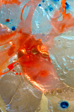 closeup macro of the intricate patterns and texture of fluids intermixing