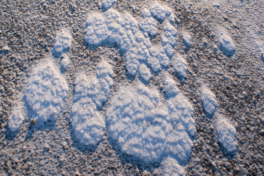 closeup of windblown snow patterns outdoors aeolian