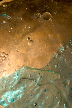 closeup macro of the intricate patterns and texture of fluids intermixing