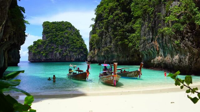 PHI PHI ISLAND, THAILAND September 15, 2020 :  Long tail boats at loh samah bay beautiful island in Thailand
