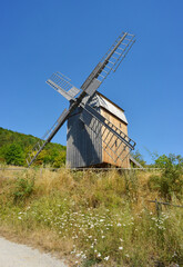 Fototapeta na wymiar Traditional old wooden windmill in Germany