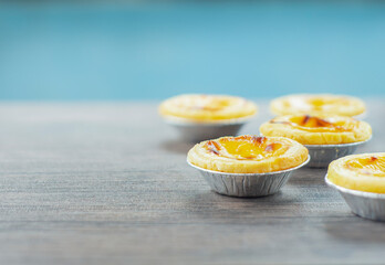 Select focus image egg tarts blur background, delicious bakery and dessert foods, and custard-based ingredients for breakfast.