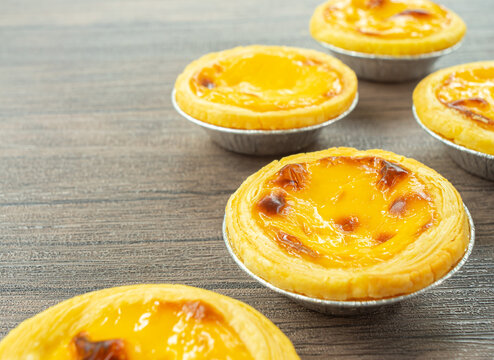 Select focus image egg tarts, delicious bakery and dessert foods, and custard-based ingredients for breakfast.