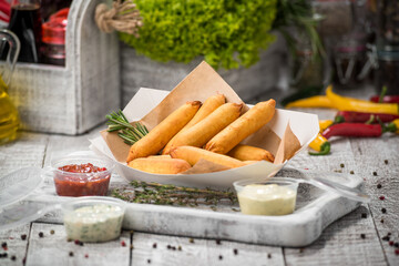 Corn dog. Sausage baked in corn dough served with ketchup