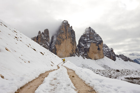 Walker and view towards Tre Cime di Lavaredo (Drei Zinnen), Dolomi