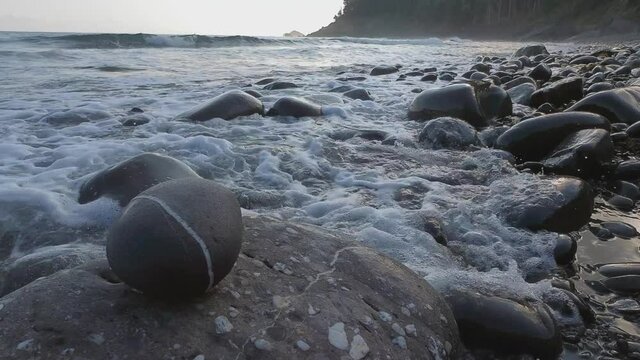 Wawe on Natural beach of Azkorri on a zen day in the Basque Country, Spain
