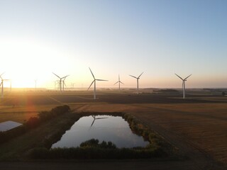 wind turbines at sunset