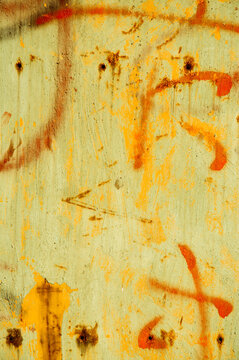 Grungy metal covered with graffiti
