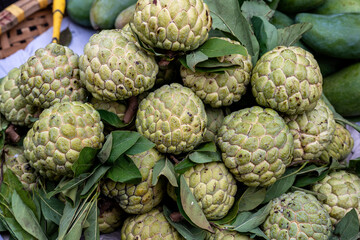 Sugar apple for sale at street food market in the old town of Hanoi, Vietnam