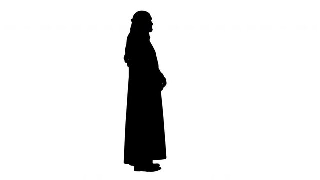 Arab sheikh wearing keffiyeh standing, Alpha Channel