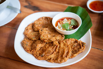 Thai fish cake in white plate.