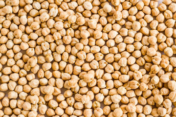 Uncooked dried chickpeas background,flat layout,harvest season concept