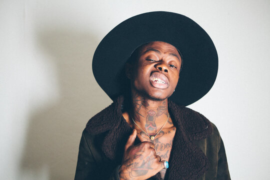 Young tattooed black man modelling