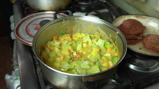 cooking ajiaco de caigua in a pot, typical peruvian food made at home