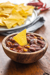 Chili con carne and tortilla chips. Mexican food with beans.