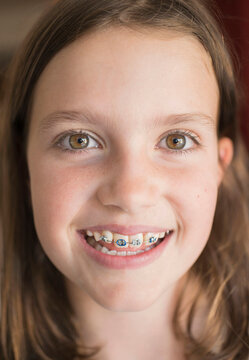 Girl (8-9) showing braces