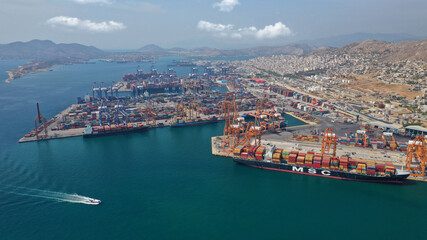 Fototapeta na wymiar Aerial drone photo of industrial cargo container logistics terminal of Perama near commercial port of Piraeus