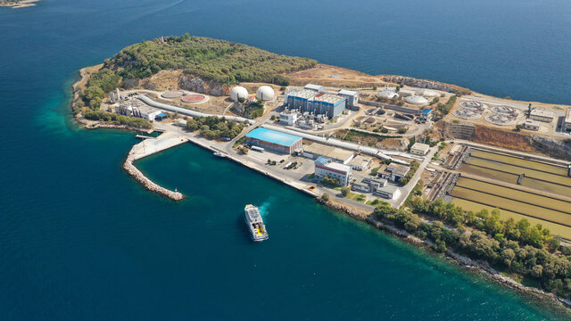 Aerial drone photo of small island of Psitaleia, a latest technology industrial sewage plant near port of Piraeus, Attica, Greece