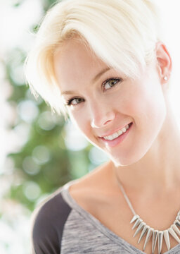 Portrait of blonde woman wearing necklace