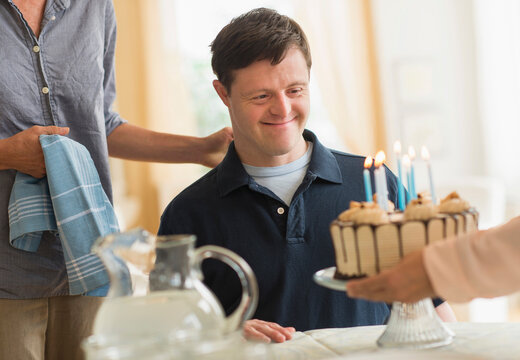 Man with down syndrome celebrating birthday