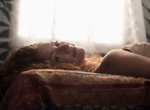 Portrait of stylish woman in bed
