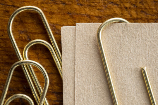 Close up of paper clips and paper