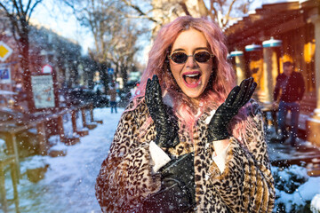 Outdoor cheerful lifestyle portrait of pretty woman with unusual pink hairs, wearing trendy body...