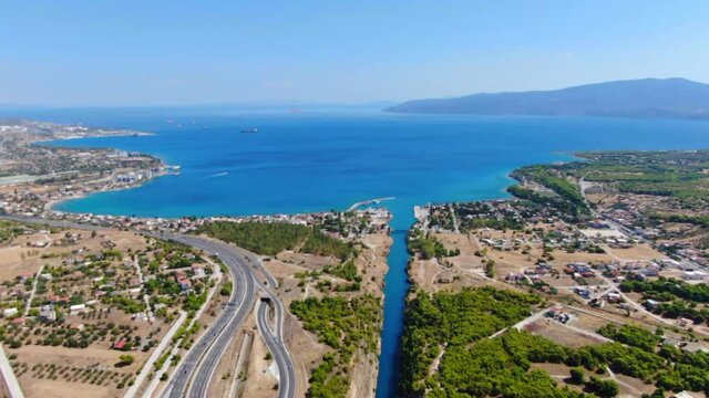 Aerial, Birds eye view of Corinth Canal and Bridge, Peloponnese, Greece 