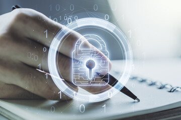 Creative lock sketch with chip hologram and man hand writing in notepad on background, protection...